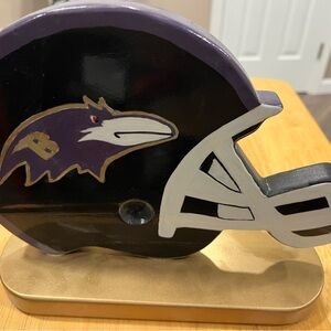 Painted Ravens helmet sculpture